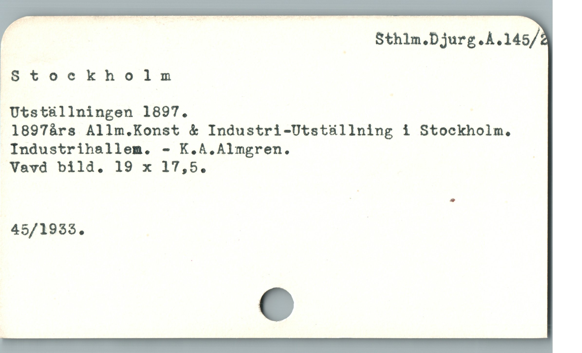  j Sthlm.Djurg.A.MS/
Stockholm
 Utst&üllningen 1897.
1897árs Allm.Konst & Industri-Utstüllning i Stockholm.
Industrihsllem. - K.A.Almgren. |
Vavd bild. 19 x 17,5.
45/1938. |
